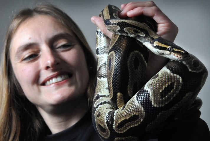 Business owner Helen Glenwright and Jeff the royal python